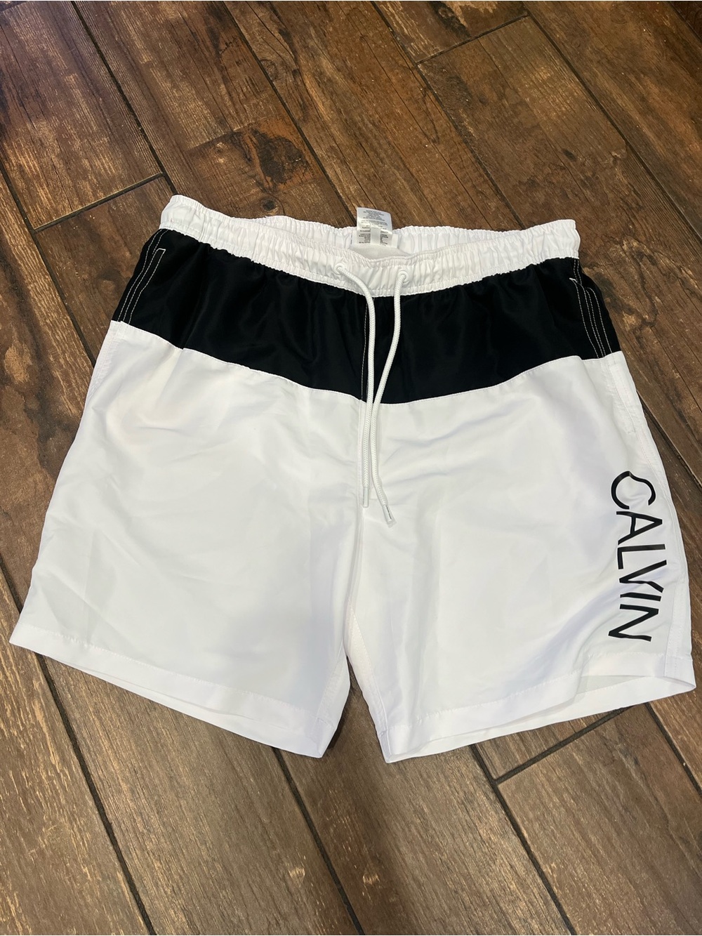 Calvin Klein White Swim Shorts with Black Logo Tag